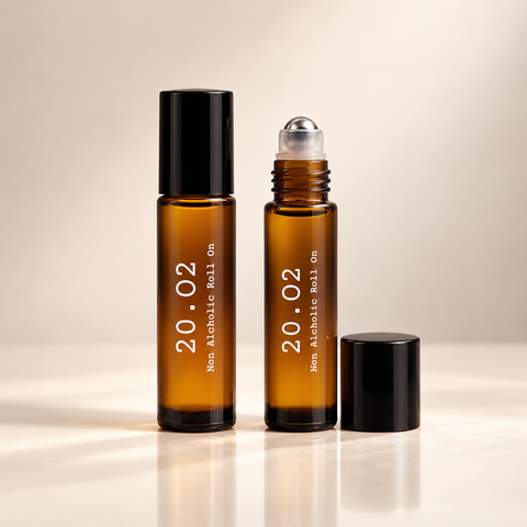 20.O2 Pocket Duo: detail of two 10ml roll-on perfume oils, one with cap removed; scents chosen at checkout.
